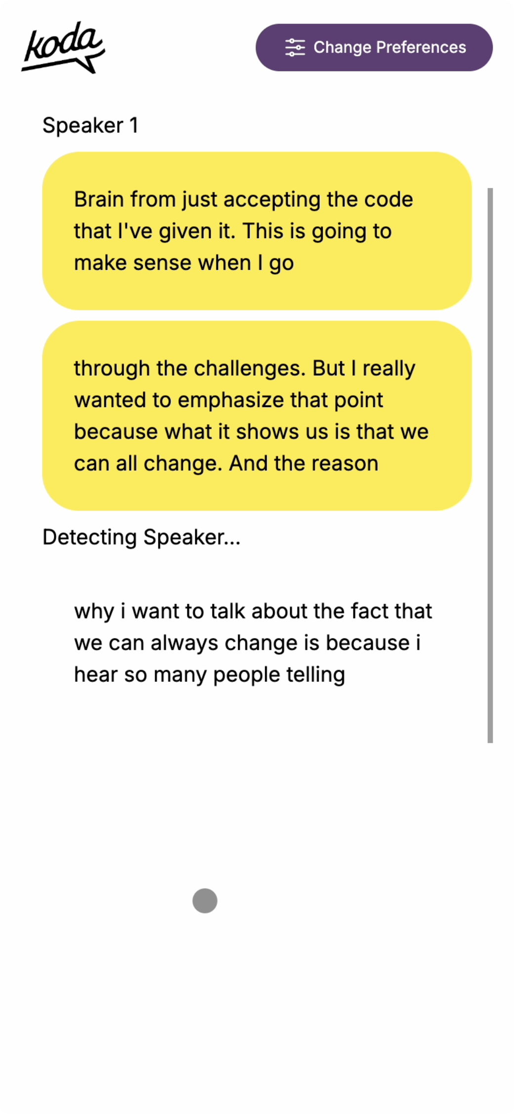 A mobile interface of a live captioning app by Koda. The screen shows captions in yellow speech bubbles for 'Speaker 1,' with text reading: 'Brain from just accepting the code that I've given it. This is going to make sense when I go through the challenges. But I really wanted to emphasize that point because what it shows us is that we can all change.' Below the speech bubbles, there is a message indicating 'Detecting Speaker...' and more transcribed text follows.